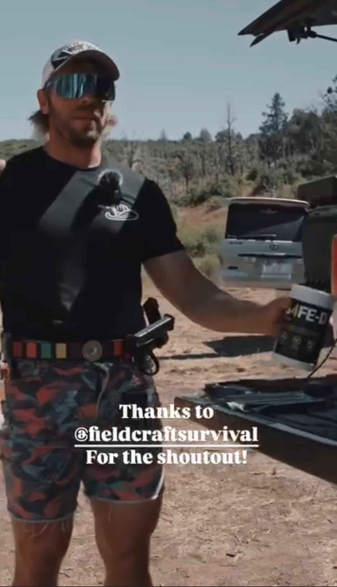 Mike Glover's Fieldcraft Survival shoutout to S4FE-D on Instagram — the host in sunglasses + S4FE-D-branded shirt at the tailgate of an off-road truck with an S4FE-D canister, 'Thanks to @fieldcraftsurvival For the shoutout!' overlay text