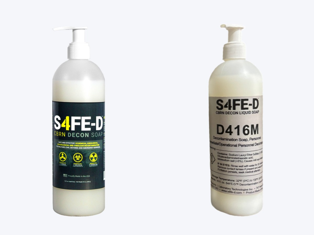 S4FE-D® Hand & Body Soap line — civilian 16 oz pump bottle (left, dark label) and Mil Spec D416M 16 oz pump bottle (right, white label) — same skin-safe surfactant chemistry, both pump-dispense for personnel decon after PPE doffing